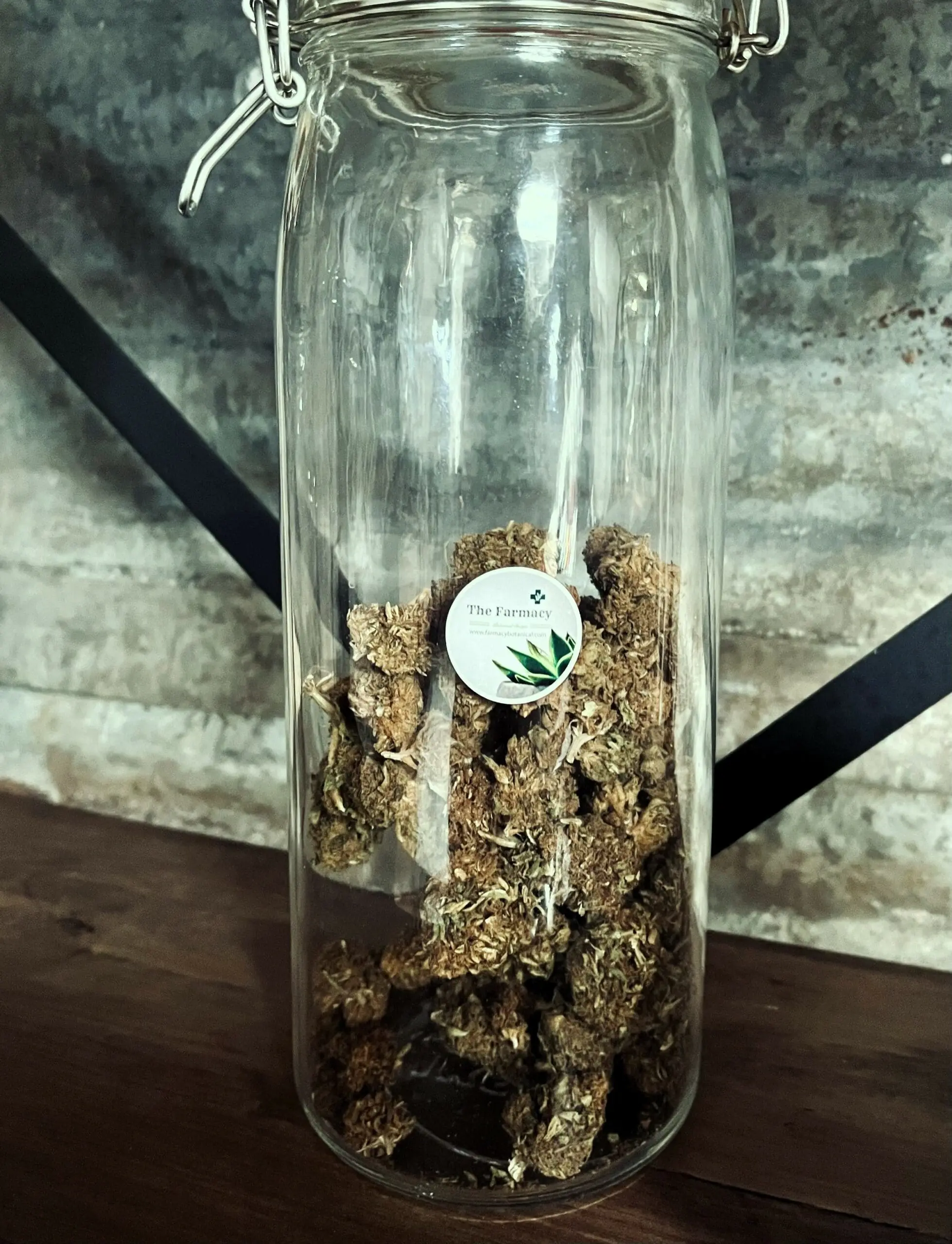 Hemp flower buds in a jar