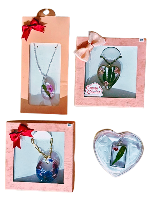 Various handmade resin necklaces with real flowers and hemp leaves