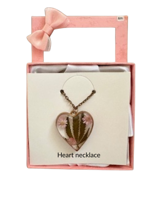 Handmade heart-shaped resin necklace with hemp leaf and flower