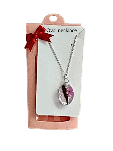 Handmade oval resin necklace with hemp leaf and pink flower