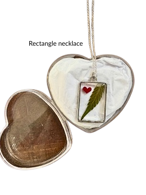Handmade rectangle resin necklace with hemp leaf and pink heart